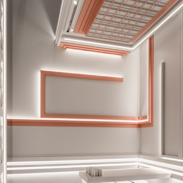 Salón con moldura Orac C381 y luz indirecta bañando el techo